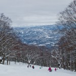 Day 3: Locals learning to snowboard on a too steep and too deep slope