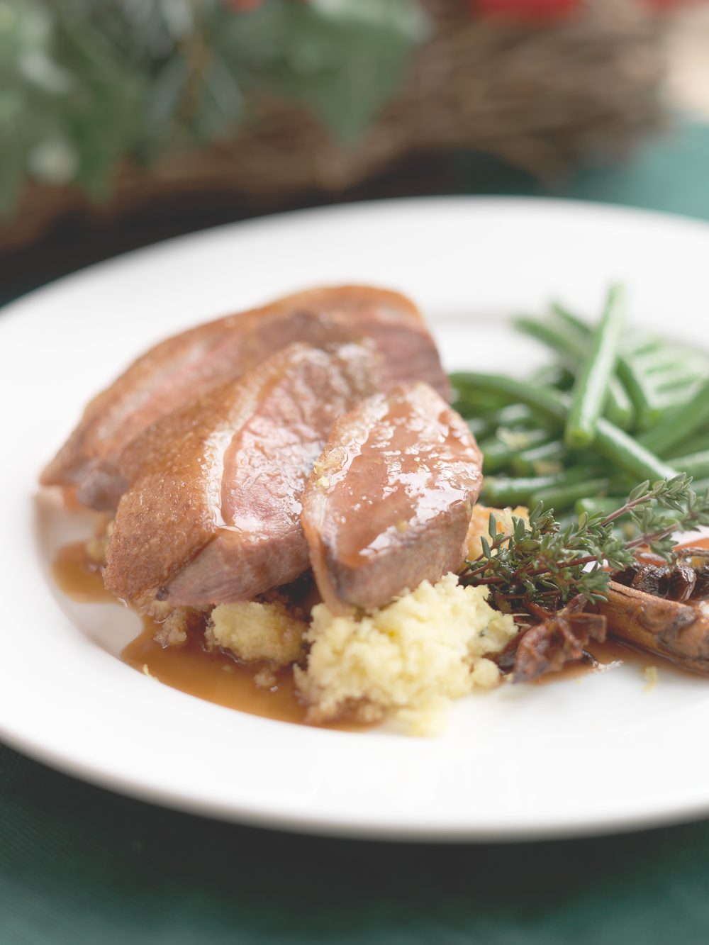 Festive duck breast with a lemon and thyme polenta